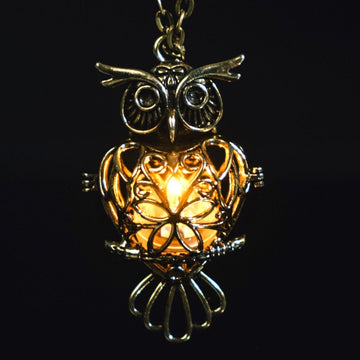 Illuminated Big Owl Gold Pendant Necklace with long chain, glowing softly with LED lights. A handcrafted, stylish accessory for special occasions.